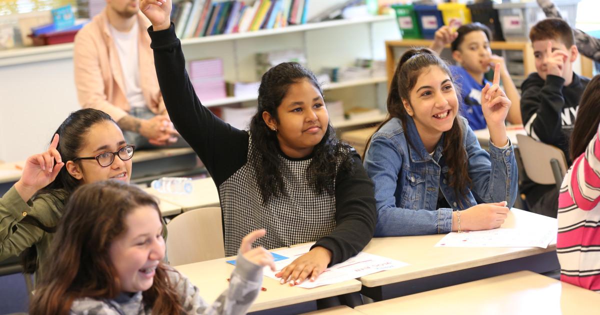 Students raising their hands